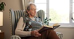 Relax, reading book and senior woman on chair in retirement home for horticulture, hobby or tips. Elderly person, education and guide in living room for learning, plant study or knowledge in house