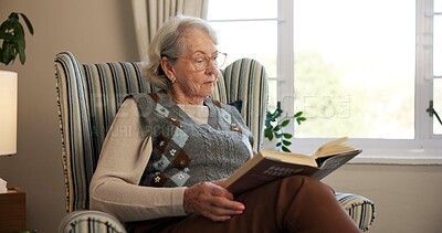 Buy stock photo Relax, reading book and senior woman on chair in retirement home for horticulture, hobby or tips. Elderly person, education and guide in living room for learning, plant study or knowledge in house