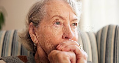 Buy stock photo Thinking, sad and senior woman in home for nostalgia, sadness and lonely with grief in retirement. House, pensioner and elderly person with depression, worry and thoughtful for memory, past and loss