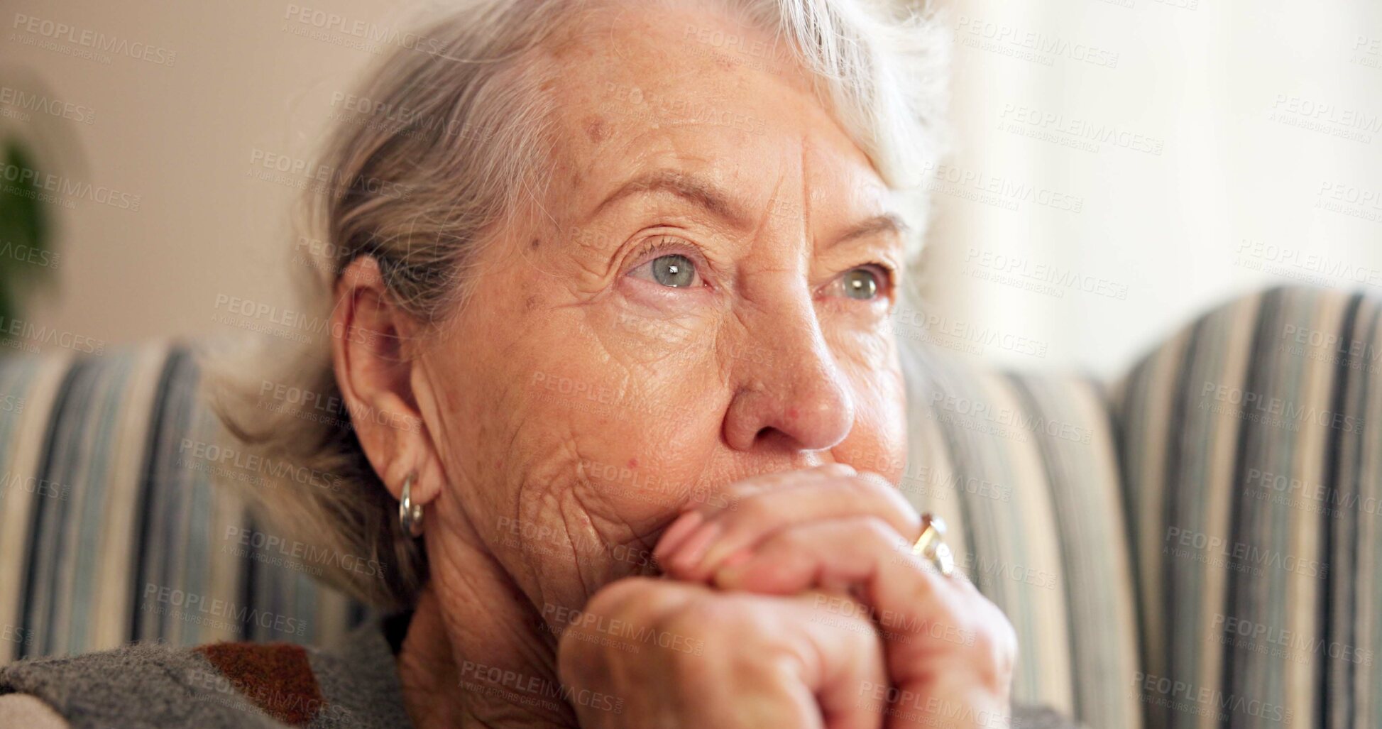 Buy stock photo Thinking, sad and senior woman in home for nostalgia, sadness and lonely with grief in retirement. House, pensioner and elderly person with depression, worry and thoughtful for memory, past and loss