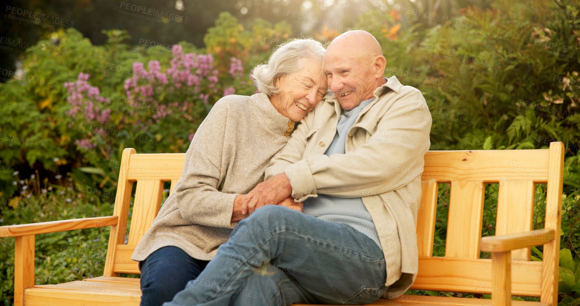 Buy stock photo Love, smile or old couple on park bench with hug, partner comfort or bonding in connection. Tender, flare or senior people outdoor with embrace, happy moment or romantic relationship in retirement.