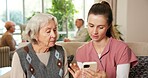 Phone, checkup and nurse with senior woman on sofa in retirement home for research on diagnosis. Technology, discussion and healthcare worker with elderly patient for medical consultation in house.