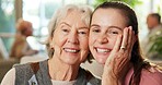 Hug, caregiver and portrait with senior woman in retirement home for assisted living or healthcare. Female person, nurse or smile with patient for elderly care, support or trust in nursing house