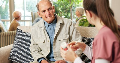 Buy stock photo Senior, man and nurse with pills in retirement home for medication or pharmaceutical advice. Elderly, male person or caregiver talking to patient with tablets for medical help, cure or treatment
