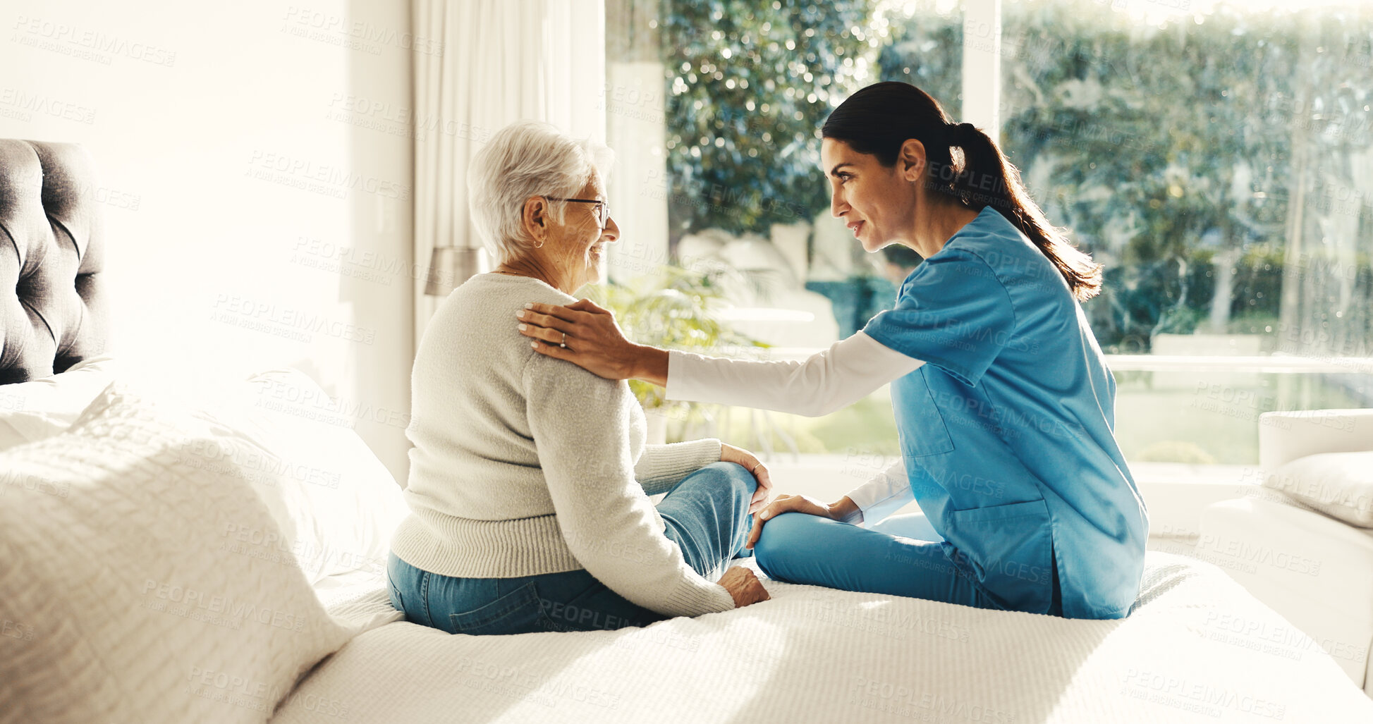 Buy stock photo Conversation, comfort and nurse with senior woman in bedroom at house for treatment planning. Discussion, support and caregiver with elderly patient for medical service or checkup in nursing home.