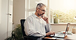 Reading, online and businessman with laptop in office, accountant or plan for taxes with information. Bookkeeper, budget review and mature person with tech, audit and financial report in business