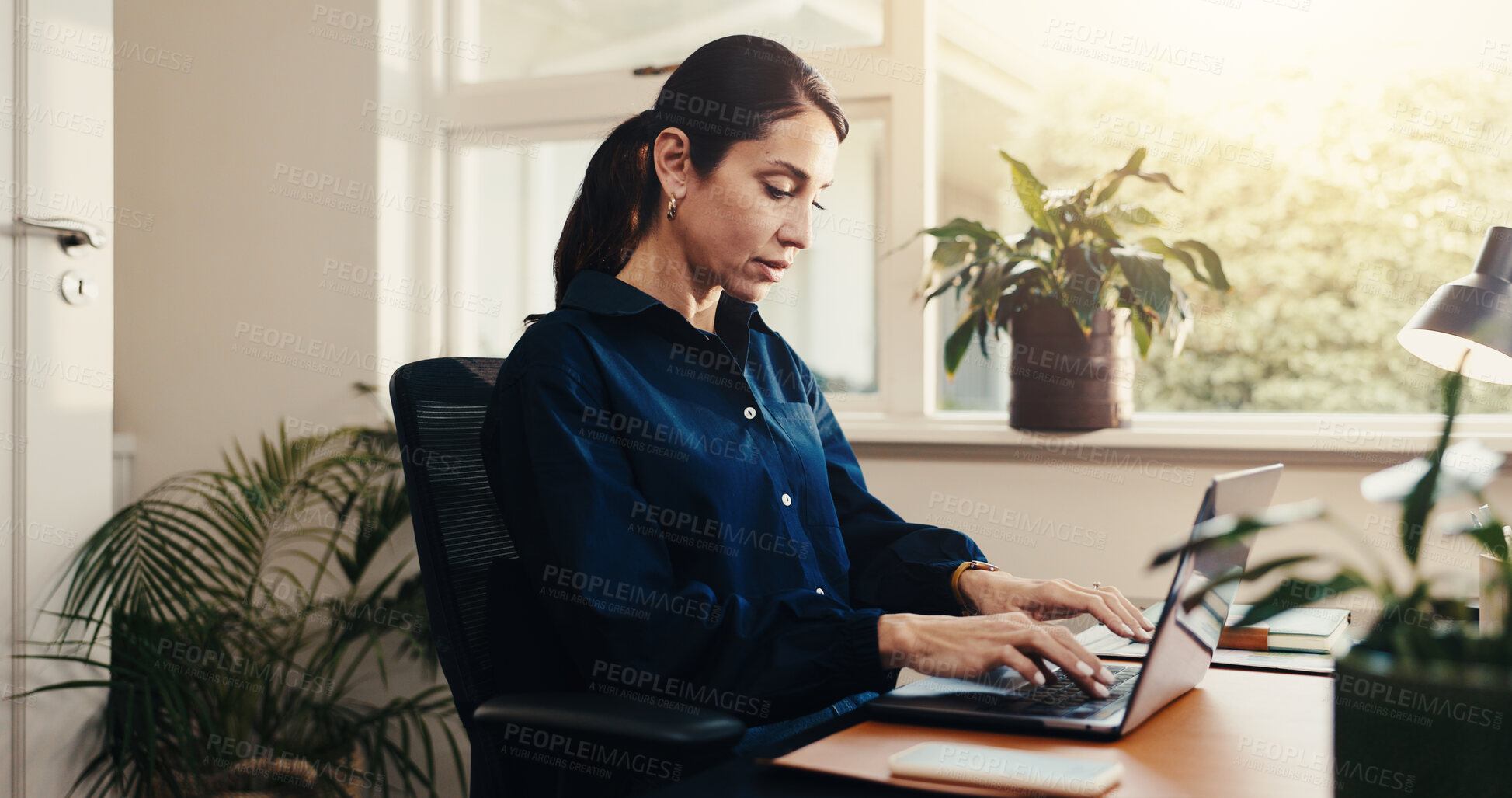 Buy stock photo Typing, online and businesswoman with laptop in office, accountant or tax preparation with research. Bookkeeper, budget review and mature person with tech, serious and financial report in business