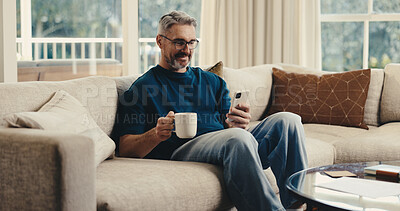 Buy stock photo Happy, man and relax at house with phone, social media and browsing online for latest movies. Smile, mature person and coffee in home with mobile app, internet search and streaming for film watchlist