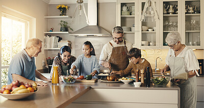 Buy stock photo Cooking, help and big family in kitchen for meal prep, supper and prepare food for bonding in home. Culinary skills, generations and happy people for dinner, conversation and thanksgiving feast