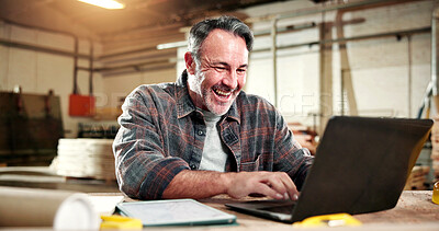 Buy stock photo Smile, carpenter and laptop with man in warehouse for construction plan, research and design software. Furniture manufacturing, online project and woodworking with mature person in workshop for craft