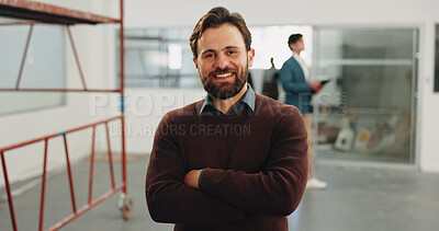 Buy stock photo Crossed arms, happy and portrait of businessman in office with confidence for remodeling project. Smile, about us and corporate employee with pride for startup company with workplace renovation.