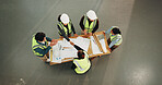 Architect, people or handshake with blueprint for construction agreement or building deal together. Top view, group or contractors shaking hands with documents for architecture project or partnership