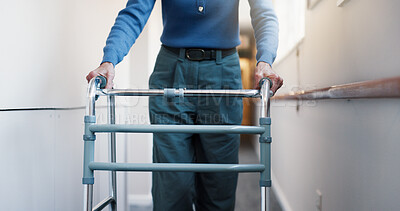 Buy stock photo Hands, woman and walking at facility with walker, support and mobility aid for injury recovery. Medical, healing and person with disability, gait training and balance assistance for physical therapy
