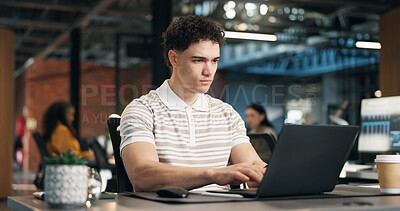 Buy stock photo Serious, man and typing in office with laptop, editing web design or productivity for online project. Tech, coworking and person with computer, digital designer problem solving and site development.