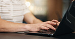 Man, hands and typing in office with laptop, online research and copywriter for newsletter campaign. Creative, person and copywriting in business with computer, email marketing and brand awareness.