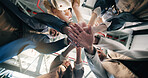 Low angle, stack and hands of business people for meeting, solidarity and collaboration in office. Circle, below and men with women in huddle for support, company goals and motivation for teamwork