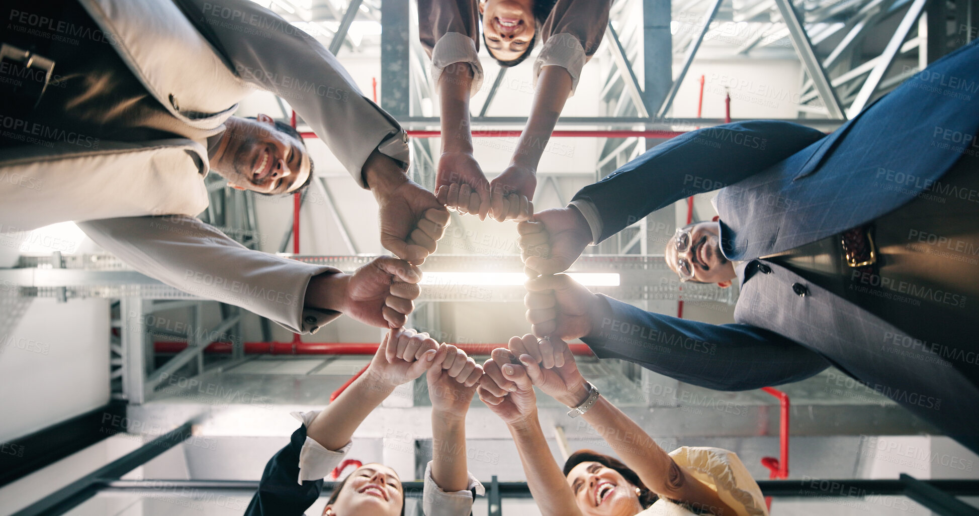 Buy stock photo Circle, fist bump and hands of business people for meeting, solidarity and collaboration in office. Happy, below and men with women in huddle for support, company goals and motivation for teamwork