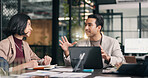 Businessman, meeting and discussion with laptop in office for project proposal or planning together. Man, employee or conversation with group, colleagues or team on computer for business development