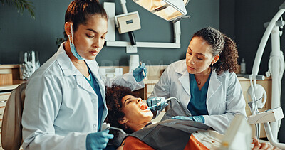 Buy stock photo Dentist, procedure and teamwork in office with patient for dental surgery or tooth extraction. Assistance, healthcare and operation with people in dentistry practice for checkup or oral care