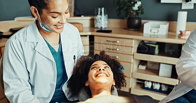 Buy stock photo Happy, dentist and patient in office with teeth whitening procedure, consultation and oral hygiene. People, smile and dental hygienist in clinic with orthodontic treatment, healthcare or satisfaction