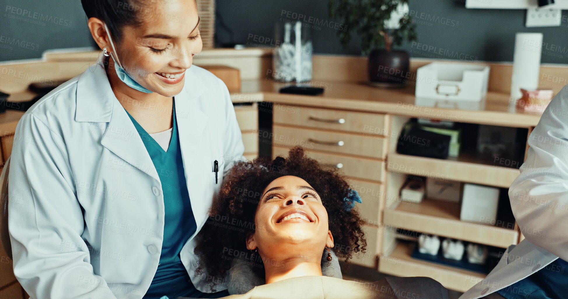 Buy stock photo Happy, dentist and patient in office with teeth whitening procedure, consultation and oral hygiene. People, smile and dental hygienist in clinic with orthodontic treatment, healthcare or satisfaction