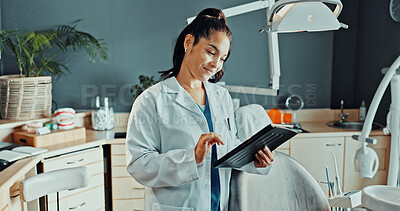 Buy stock photo Tablet, reading and dentist in clinic with research for dental care, treatment or oral hygiene tips. Digital technology, woman and orthodontist on app for medical information or healthcare schedule.