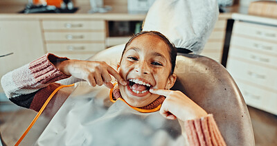Buy stock photo Portrait, teeth and happy girl with dental hygiene in clinic for oral healthcare or treatment. Child, kid or smile with open mouth, gum care or satisfaction for dentist cleaning, exam or appointment
