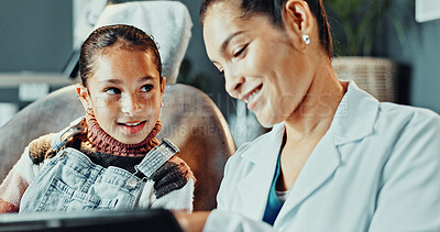 Buy stock photo Dentist, child and tablet in clinic with consultation, education and discussion for dental hygiene. Oral hygienist, girl and talk in office with tech, medical help or kid learning about orthodontics.