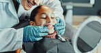 Mirror, dentistry and kid in clinic for teeth cleaning, service or oral hygiene for wellness. Happy, orthodontist and girl child with consultation for braces, dental care or gum health in office.