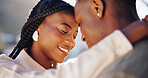 Forehead, touch and happy couple on break, outdoor and connection with partner and bonding together. Black people, embrace and smile with spouse on weekend, relationship and relax on anniversary