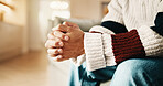 Nervous, hands and person with anxiety on couch for stress, trauma processing or PTSD therapy. Sofa, counseling and man waiting with worry for pressure, mental health or psychology patient at office