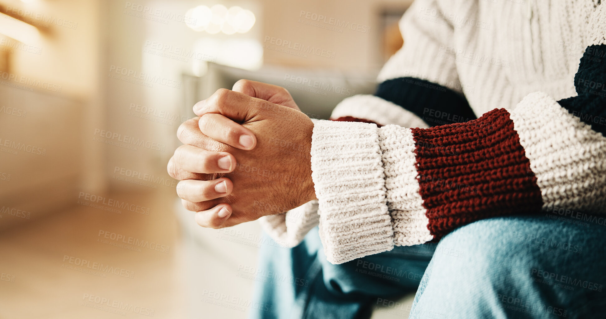 Buy stock photo Nervous, hands and person with anxiety on couch for stress, trauma processing or PTSD therapy. Sofa, counseling and man waiting with worry for pressure, mental health or psychology patient at office