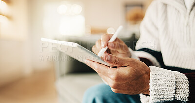 Buy stock photo Hands, tablet and man with pen in home for remote work, web design and research for project. Freelancer, sofa and person with tech, stylus and internet for digital ui, planning and website content