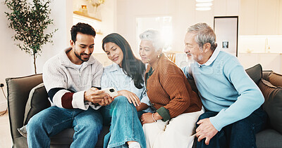 Buy stock photo Cellphone, conversation and couple with senior parents on sofa for social media, texting or reading blog. Learning, phone and people teaching elderly mom and dad on mobile app in living room at house