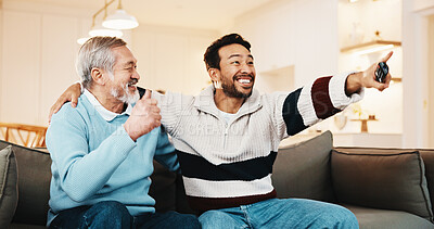 Buy stock photo Watching tv, excited man and senior father in home for score, streaming sports or game together. Asian people, adult son and television in living room for winning, bonding or pointing for match goal