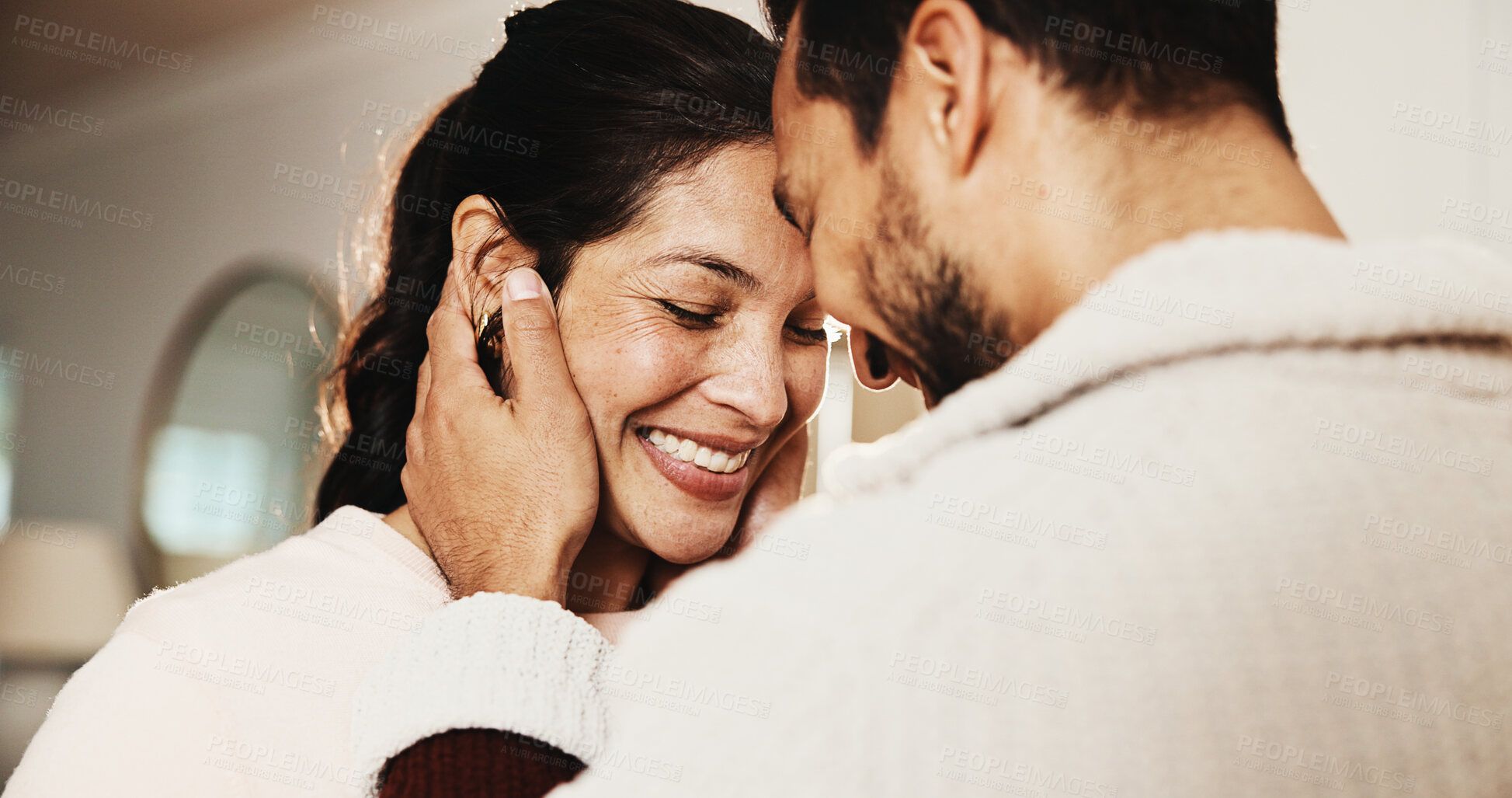 Buy stock photo Forehead, touch and happy couple in home, love and bonding with partner on break or marriage loyalty. People, hug and connection with spouse, relationship commitment and relax with smile on weekend
