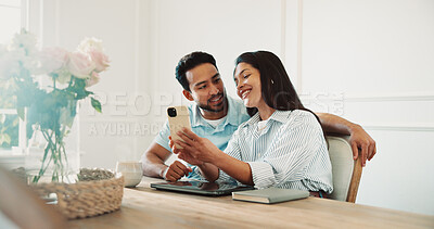Buy stock photo Video call, smile and couple with cellphone in home for communication, bonding and networking. Happy, technology and man with woman on phone for virtual conversation in house together on weekend.