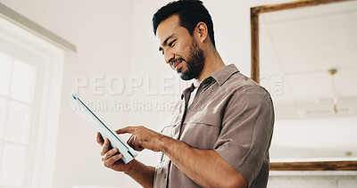 Buy stock photo Tablet, remote work and man in home with research, story editing or happy with manuscript draft. Tech, freelancer and person reading review on internet, creative chapter and author publication