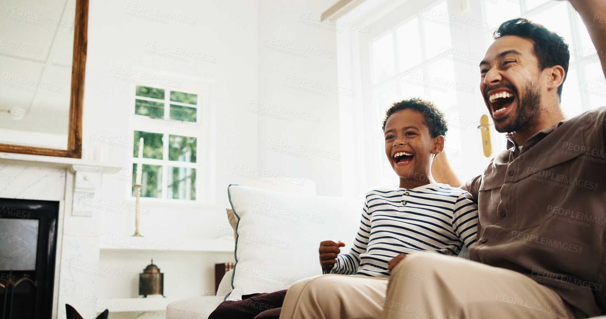 Buy stock photo Happy, cheer and dad with child on sofa for bonding, watching tv and sports on weekend together. Family, home and father with boy for celebration, winning and broadcast for match, game and score