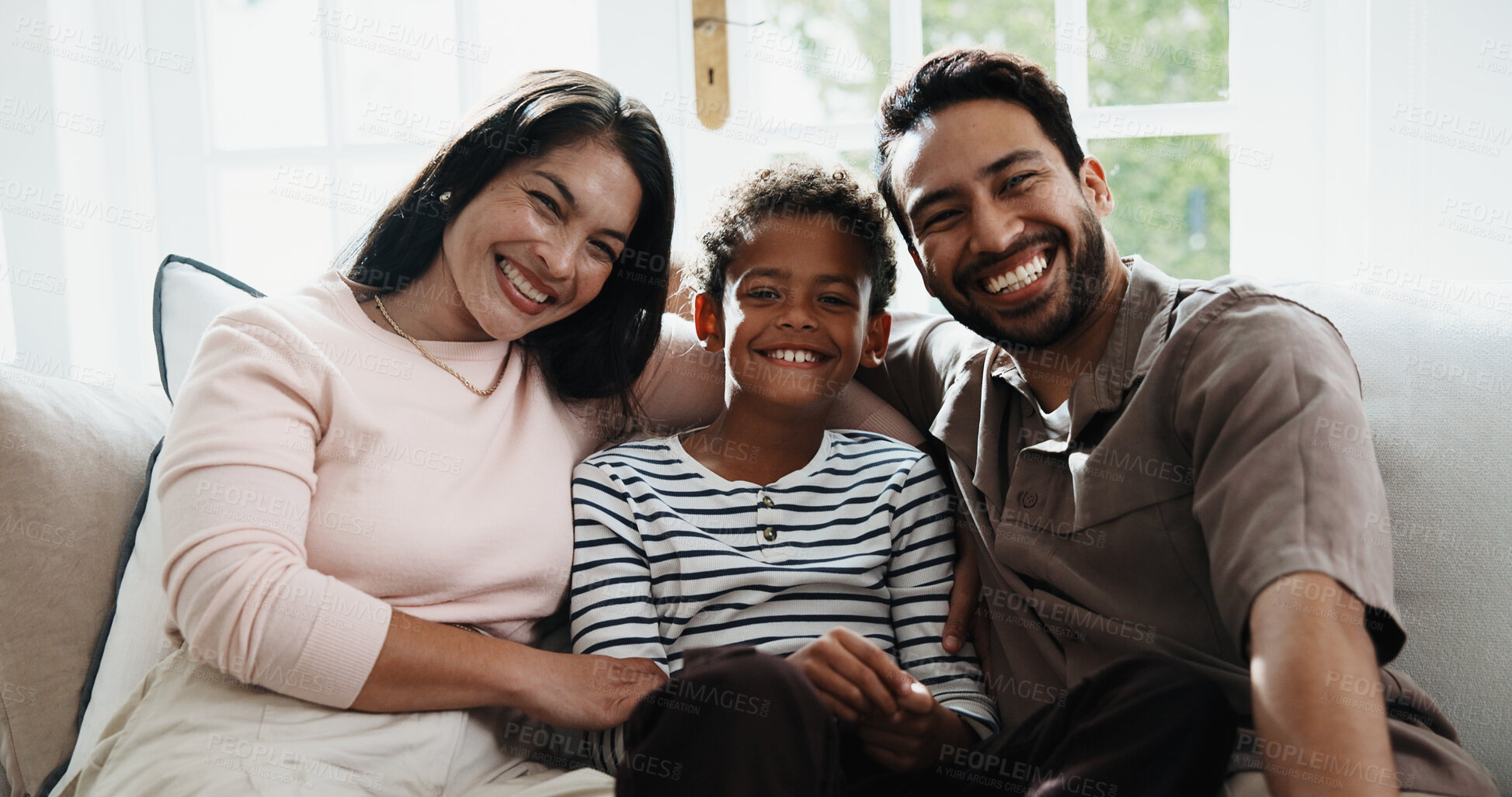 Buy stock photo Happy, portrait and child with parents on sofa for bonding, connection and relax on weekend together. Family, home and boy with mom, dad and smile for relationship, support and security for love