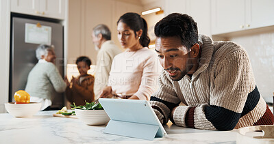Buy stock photo Man, tablet and big family in kitchen for meal prep, supper and prepare food for bonding in home. Generations, people and internet guide for online recipe, conversation and connection for holiday