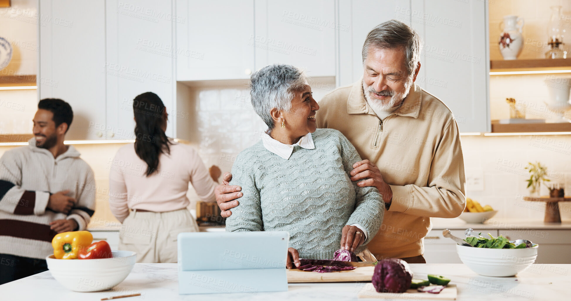Buy stock photo Cooking, tablet and senior couple in kitchen at house for preparing meal together on weekend. Laugh, digital technology and elderly man with woman for online recipe with nutrition dinner in home.