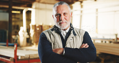 Buy stock photo Portrait, man and carpenter in warehouse with arms crossed, timber manufacturing or craftsman skills. Serious, mature person and operations manager in workshop with confidence, woodwork or carpentry.