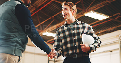 Buy stock photo Architect, man and handshake with colleague in warehouse for construction deal or partnership. Male people, employees or contractor shaking hands with helmet for b2b, building or onboarding project