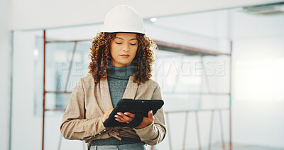 Buy stock photo Architect, woman and research at construction site with tablet, building regulations or compliance. Person, reading and PPE with tech to check safety policy, architecture plan and design evaluation.