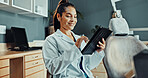 Happy, dentist and reading at clinic with tablet, research and test results for dental care. Smile, woman and review with digital app for dentistry, appointment details and information for treatment