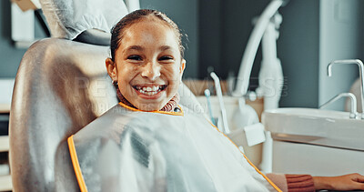 Buy stock photo Portrait, kid and chair with smile for dentistry, appointment and satisfaction of teeth whitening. Happy, child and patient at dental clinic for checkup, cleaning mouth and treatment for oral hygiene