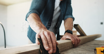 Buy stock photo Hands, carpenter and sandpaper for construction with wood, restoration and furnishing for expansion. Person, sanding or timber at worksite for carpentry, smooth surface and woodworking for renovation