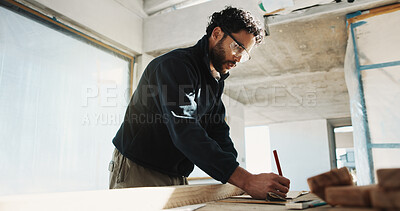 Buy stock photo Man, carpenter and writing at site for construction, reminder and furnishing notes for expansion. Male person, notebook and timber with wood for carpentry, measurements and information for renovation