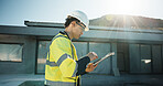 Engineer, outdoor and man with tablet, online or plan for property development on construction site. Civil engineering, person and quality assurance with tech, flare and renovation project on roof